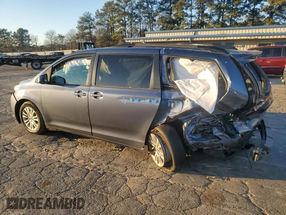 2016 Toyota Sienna XLE с VIN 5TDYK3DC6GS691111, выставлен на аукционе Copart как лот 87195014 с пробегом 196 691 миль миль и Списание • Salvage title. История ставок и продаж доступна на DreamBid. Изображение 2.