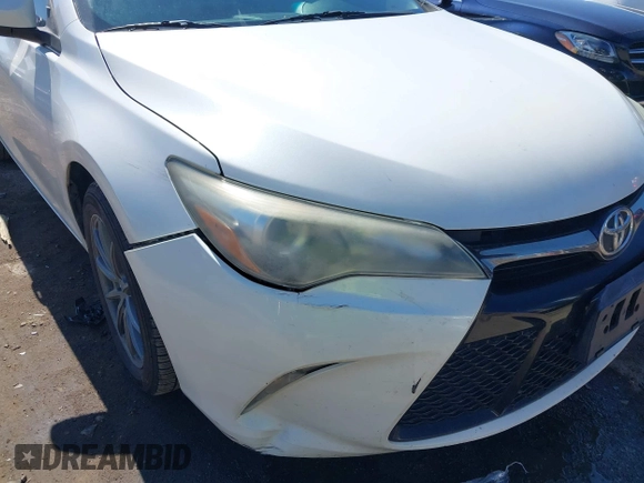 2015 Toyota Camry XLE with VIN 4T1BF1FK5FU114661, listed as a IAAI auction lot 41633878 with 124,013 mi miles and . Bid and sale history available at DreamBid. Image 6.