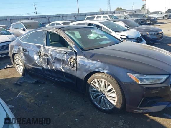 2019 Audi A7 z VIN WAUP2AF23KN033262, wystawiony jako IAAI lot #40678864 z przebiegiem 97 925 mil mil oraz . Historia ofert i sprzedaży dostępna na DreamBid. Obrazek 13.
