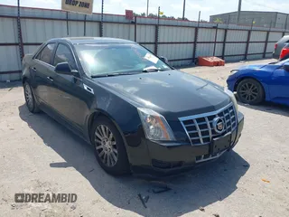 2012 Cadillac CTS with VIN 1G6DA5E56C0124667, listed as a IAAI auction lot 42051436 with 100,836 mi miles and . Bid and sale history available at DreamBid. Image 1.