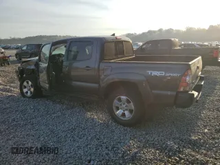 2015 Toyota Tacoma PreRunner with VIN 3TMJU4GN5FM180924, listed as a Copart auction lot 50864315 with 176,562 mi miles and Salvage title. Bid and sale history available at DreamBid. Image 2.