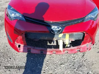 2018 Toyota Corolla L z VIN 2T1BURHE6JC057196, wystawiony jako IAAI lot #42305307 z przebiegiem 106 670 mil mil oraz . Historia ofert i sprzedaży dostępna na DreamBid. Obrazek 6.