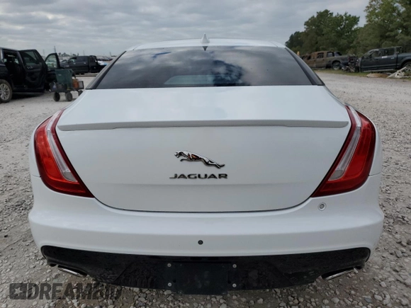 2016 Jaguar XJ R-Sport z VIN SAJWA1C71G8V92642, wystawiony jako Copart lot #53094125 z przebiegiem 98 548 mil mil oraz Szkoda całkowita • Salvage title. Historia ofert i sprzedaży dostępna na DreamBid. Obrazek 6.