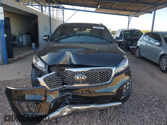 2016 Kia Sorento SX with VIN 5XYPKDA52GG001519, listed as a Copart auction lot 52014675 with 33,932 mi miles and Salvage Title. Bid and sale history available at carsss.com. Image 5.