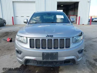 2015 Jeep Grand Cherokee Altitude with VIN 1C4RJFAG3FC210151, listed as a IAAI auction lot 41865151 with 122,579 mi miles. Bid and sale history available at carsss.com. Image 12.