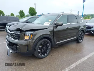 2024 Kia Telluride SX Prestige X-Pro with VIN 5XYP5DGCXRG530586, listed as a IAAI auction lot 42225560 with 7,880 mi miles and . Bid and sale history available at DreamBid. Image 2.