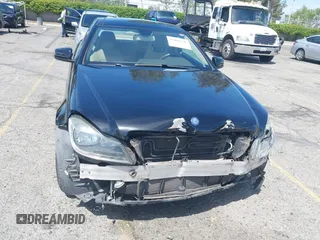 2014 Mercedes-Benz C-Class C 250 with VIN WDDGJ4HBXEG296917, listed as a IAAI auction lot 42068339 with 124,872 mi miles. Bid and sale history available at carsss.com. Image 12.