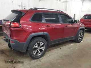 2015 Jeep Cherokee Trailhawk z VIN 1C4PJMBS9FW509642, wystawiony jako Copart lot #52385555 z przebiegiem 135 477 mil mil oraz Szkoda całkowita • Salvage title. Historia ofert i sprzedaży dostępna na DreamBid. Obrazek 3.