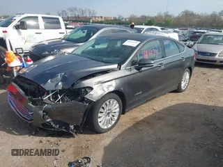 2016 Ford Fusion SE Hybrid with VIN 3FA6P0LU7GR218781, listed as a IAAI auction lot 41844791 with 214,867 mi miles. Bid and sale history available at carsss.com. Image 2.