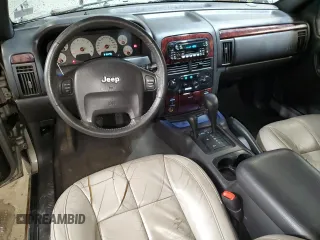 2001 Jeep Grand Cherokee Limited with VIN 1J4GW58N91C664611, listed as a Copart auction lot 53330755 with 212,479 mi miles and Salvage Title. Bid and sale history available at carsss.com. Image 8.