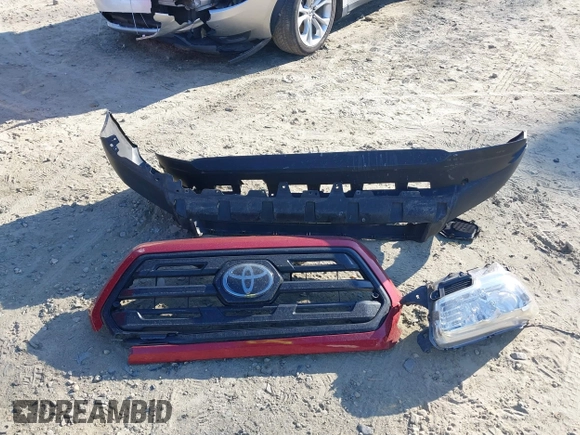 2018 Toyota Tacoma SR with VIN 5TFRX5GN9JX124598, listed as a IAAI auction lot 41666257 with 120,555 mi miles and . Bid and sale history available at DreamBid. Image 12.