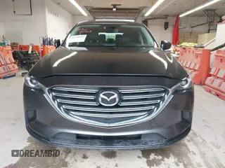 2017 Mazda CX-9 Touring with VIN JM3TCBCY1H0127229, listed as a IAAI auction lot 42320263 with 85,890 mi miles and . Bid and sale history available at DreamBid. Image 12.