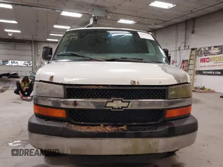 2004 Chevrolet Express Passenger z VIN 1GAHG39U641233542, wystawiony jako IAAI lot #42007195 z przebiegiem 241 963 mil mil oraz . Historia ofert i sprzedaży dostępna na DreamBid. Obrazek 13.