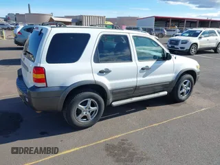 2006 Ford Escape XLT with VIN 1FMCU03116KA05836, listed as a IAAI auction lot 42310284 with 128,620 mi miles and . Bid and sale history available at DreamBid. Image 4.