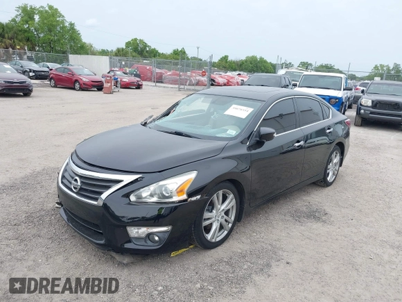 2015 Nissan Altima SL z VIN 1N4BL3AP8FC214826, wystawiony jako IAAI lot #39070354 z przebiegiem 84 949 mil mil oraz . Historia ofert i sprzedaży dostępna na DreamBid. Obrazek 2.