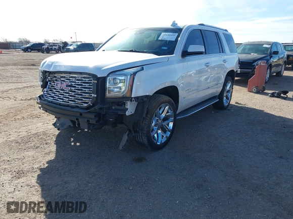 2020 GMC Yukon Denali with VIN 1GKS2CKJ3LR260455, listed as a IAAI auction lot 41690495 with 92,498 mi miles. Bid and sale history available at carsss.com. Image 2.