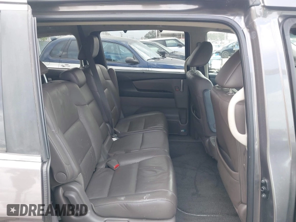 2011 Honda Odyssey EX-L with VIN 5FNRL5H61BB072124, listed as a IAAI auction lot 42115299 with 155,086 mi miles and . Bid and sale history available at DreamBid. Image 8.