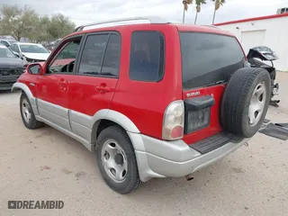 2004 Suzuki Grand Vitara with VIN JS3TE62V344100216, listed as a IAAI auction lot 41734638 with 213,166 mi miles. Bid and sale history available at carsss.com. Image 3.