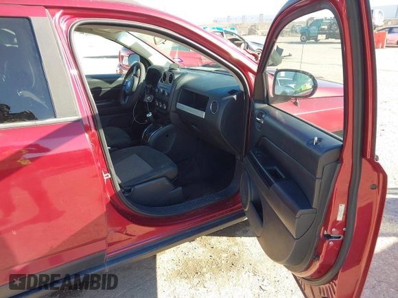2014 Jeep Compass Sport with VIN 1C4NJCBA3ED812435, listed as a IAAI auction lot 41424374 with 174,663 mi miles and . Bid and sale history available at DreamBid. Image 5.