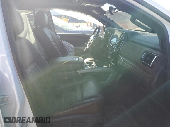 2021 Nissan Titan SV with VIN 1N6AA1FB0MN517885, listed as a Copart auction lot 77046004 with 52,284 mi miles and Salvage title. Bid and sale history available at DreamBid. Image 7.