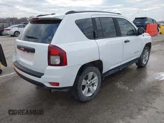 2016 Jeep Compass Sport with VIN 1C4NJDBB5GD804581, listed as a IAAI auction lot 41502976 with 196,351 mi miles and . Bid and sale history available at carsss.com. Image 4.