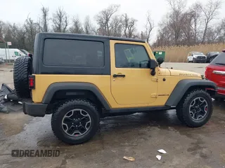 2013 Jeep Wrangler Rubicon 10th Anniversary with VIN 1C4BJWCG5DL688504, listed as a IAAI auction lot 41797184 with 109,414 mi miles and . Bid and sale history available at DreamBid. Image 13.