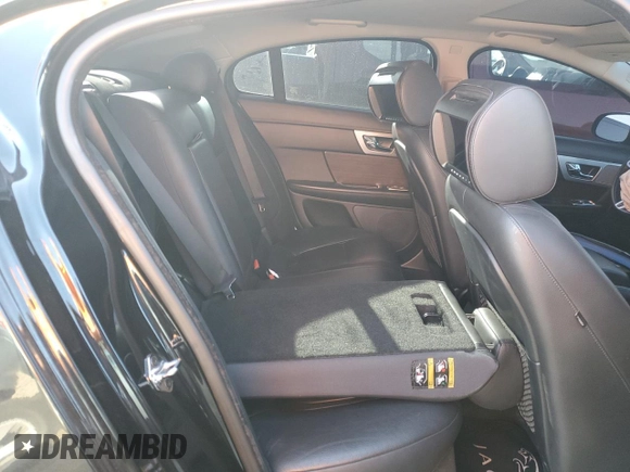 2013 Jaguar XF RWD with VIN SAJWA0ESXDPU05766, listed as a Copart auction lot 48254405 with 72,055 mi miles and Salvage Title. Bid and sale history available at DreamBid. Image 10.