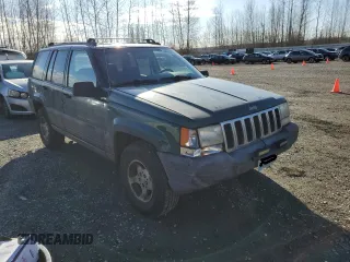 1996 Jeep Grand Cherokee Laredo with VIN 1J4GZ58S0TC245935, listed as a Copart auction lot 44782555 with 268,742 mi miles and Salvage Title. Bid and sale history available at carsss.com. Image 4.