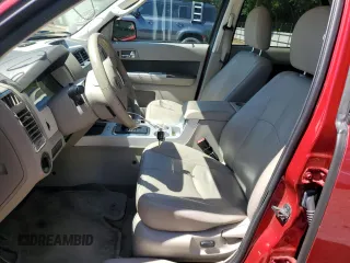 2011 Mercury Mariner Premier with VIN 4M2CN8HG0BKJ08313, listed as a Copart auction lot 57630215 with 188,818 mi miles and Salvage title. Bid and sale history available at DreamBid. Image 7.