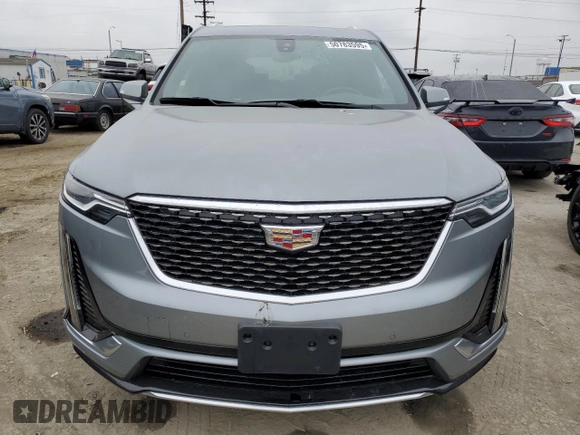 2023 Cadillac XT6 FWD Luxury z VIN 1GYKPAR47PZ147139, wystawiony jako Copart lot #50783595 z przebiegiem 27 684 mil mil oraz Szkoda całkowita • Salvage title. Historia ofert i sprzedaży dostępna na DreamBid. Obrazek 5.