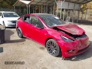 2023 Tesla Model Y Performance with VIN 7SAYGDEF6PF870935, listed as a IAAI auction lot 40718563 with 15,286 mi miles and . Bid and sale history available at DreamBid. Image 1.
