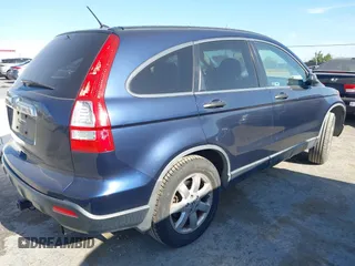 2007 Honda CR-V EX z VIN JHLRE485X7C090902, wystawiony jako IAAI lot #42359995 z przebiegiem 292 022 mil mil oraz . Historia ofert i sprzedaży dostępna na DreamBid. Obrazek 4.