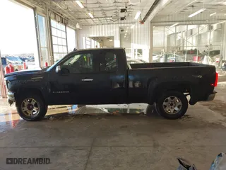 2010 Chevrolet Silverado 1500 LT with VIN 1GCSKSE31AZ155171, listed as a IAAI auction lot 41619404 with 209,422 mi miles. Bid and sale history available at carsss.com. Image 14.