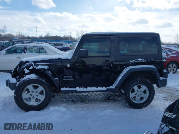 2014 Jeep Wrangler Sport with VIN 1C4AJWAG5EL285994, listed as a IAAI auction lot 41558673 with 98,779 mi miles and . Bid and sale history available at DreamBid. Image 13.