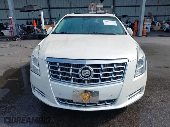 2013 Cadillac XTS Premium z VIN 2G61S5S35D9103948, wystawiony jako IAAI lot #42090444 z przebiegiem 154 728 mil mil oraz . Historia ofert i sprzedaży dostępna na DreamBid. Obrazek 12.