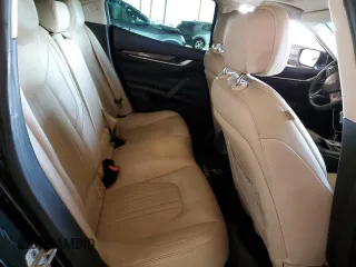 2015 Maserati Ghibli z VIN ZAM57XSA2F1146396, wystawiony jako Copart lot #56568585 z przebiegiem 85 556 mil mil oraz Szkoda całkowita • Salvage title. Historia ofert i sprzedaży dostępna na DreamBid. Obrazek 10.