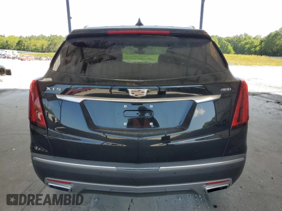 2021 Cadillac XT5 FWD Premium Luxury с VIN 1GYKNCRSXMZ155473, выставлен на аукционе Copart как лот 59883874 с пробегом 2 038 миль миль и Списание • Salvage title. История ставок и продаж доступна на DreamBid. Изображение 6.