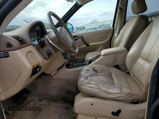 2001 Mercedes-Benz M-Class with VIN 4JGAB54E61A276417, listed as a Copart auction lot 82878094 with 205,577 mi miles and Salvage Title. Bid and sale history available at carsss.com. Image 7.