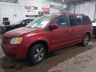 2009 Dodge Grand Caravan SE with VIN 2D8HN44E89R698072, listed as a IAAI auction lot 41649569 with 188,433 mi miles. Bid and sale history available at carsss.com. Image 2.