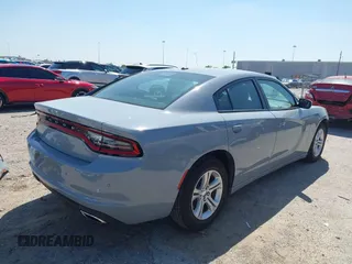 2022 Dodge Charger SXT with VIN 2C3CDXBG7NH204659, listed as a IAAI auction lot 41882695 with 49,773 mi miles and . Bid and sale history available at DreamBid. Image 4.