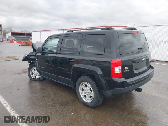 2014 Jeep Patriot Sport with VIN 1C4NJRBBXED879285, listed as a IAAI auction lot 41944152 with 103,676 mi miles. Bid and sale history available at carsss.com. Image 3.