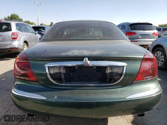 1998 Lincoln Continental with VIN 1LNFM97V8WY707809, listed as a Copart auction lot 70842654 with 175,066 mi miles and Salvage Title. Bid and sale history available at carsss.com. Image 6.