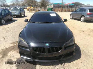 2014 BMW 6 Series 640i z VIN WBA6A0C57EDZ04682, wystawiony jako IAAI lot #41891362 z przebiegiem 140 478 mil mil oraz . Historia ofert i sprzedaży dostępna na DreamBid. Obrazek 12.