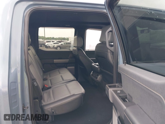 2023 Ford F-150 Lightning Pro with VIN 1FT6W1EVXPWG53591, listed as a IAAI auction lot 42249385 with 17,892 mi miles and . Bid and sale history available at DreamBid. Image 8.