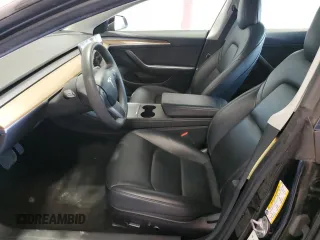2023 Tesla Model 3 z VIN 5YJ3E1EA1PF450693, wystawiony jako Copart lot #63134005 z przebiegiem 65 116 mil mil oraz Czysty tytuł • Clean title. Historia ofert i sprzedaży dostępna na DreamBid. Obrazek 7.