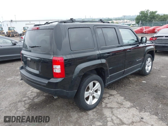 2014 Jeep Patriot Latitude with VIN 1C4NJRFB1ED501740, listed as a IAAI auction lot 42722549 with 147,974 mi miles and . Bid and sale history available at DreamBid. Image 4.