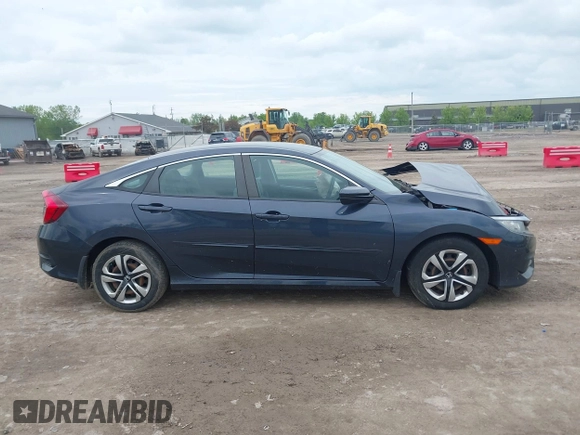 2017 Honda Civic LX z VIN 2HGFC2F54HH567210, wystawiony jako IAAI lot #42254401 z przebiegiem 30 126 mil mil oraz . Historia ofert i sprzedaży dostępna na DreamBid. Obrazek 13.