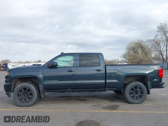 2017 Chevrolet Silverado 1500 LT with VIN 3GCUKREC7HG220780, listed as a IAAI auction lot 41978463 with 131,532 mi miles and . Bid and sale history available at DreamBid. Image 14.