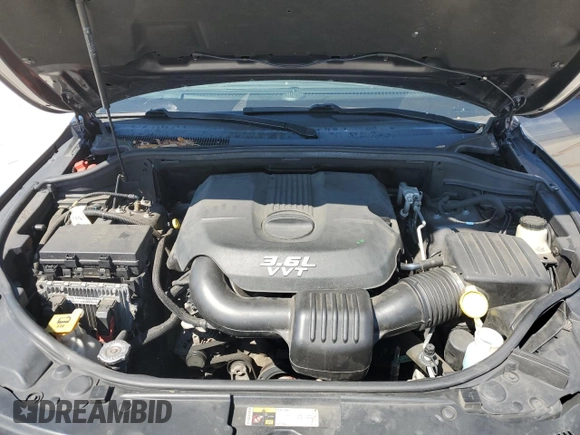 2014 Jeep Grand Cherokee Summit with VIN 1C4RJFJGXEC159438, listed as a Copart auction lot 50864595 with 134,558 mi miles and Salvage title. Bid and sale history available at DreamBid. Image 14.