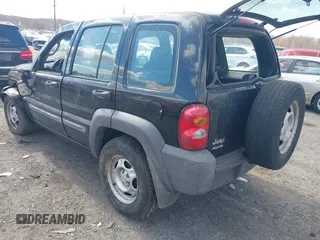 2002 Jeep Liberty Sport with VIN 1J4GL48K82W345855, listed as a IAAI auction lot 41687317 with 231,969 mi miles. Bid and sale history available at carsss.com. Image 3.